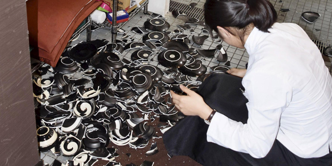 Broken dishes are seen at a restaurant after an earthquake in Kumamoto, southern Japan, in this photo taken by Kyodo April 14, 2016. Mandatory credit REUTERS/Kyodo  ATTENTION EDITORS - FOR EDITORIAL USE ONLY. NOT FOR SALE FOR MARKETING OR ADVERTISING CAMPAIGNS. MANDATORY CREDIT. JAPAN OUT. NO COMMERCIAL OR EDITORIAL SALES IN JAPAN. THIS IMAGE WAS PROCESSED BY REUTERS TO ENHANCE QUALITY, AN UNPROCESSED VERSION WILL BE PROVIDED SEPARATELY.      