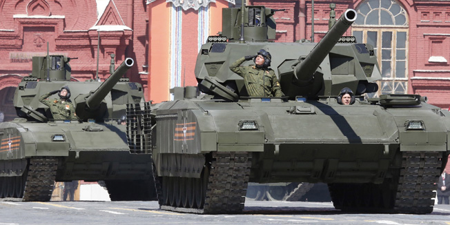 Russian servicemen drive T-14 