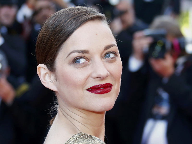 Cast member Marion Cotillard arrives on red carpet for the screening of the film 