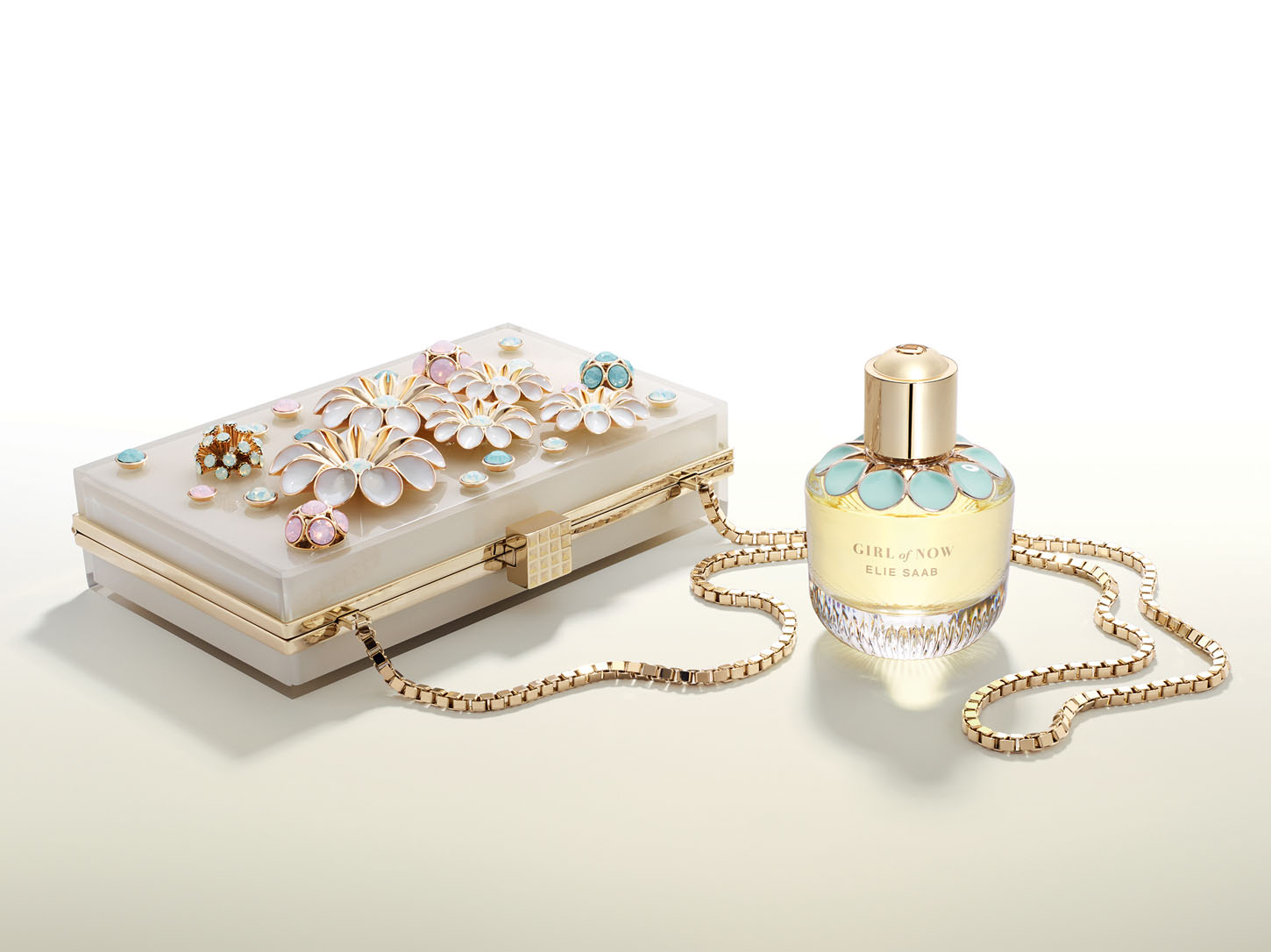 ES_GirlofNow_Still Life_Bottle_and_Clutch_1_CMYK_HD