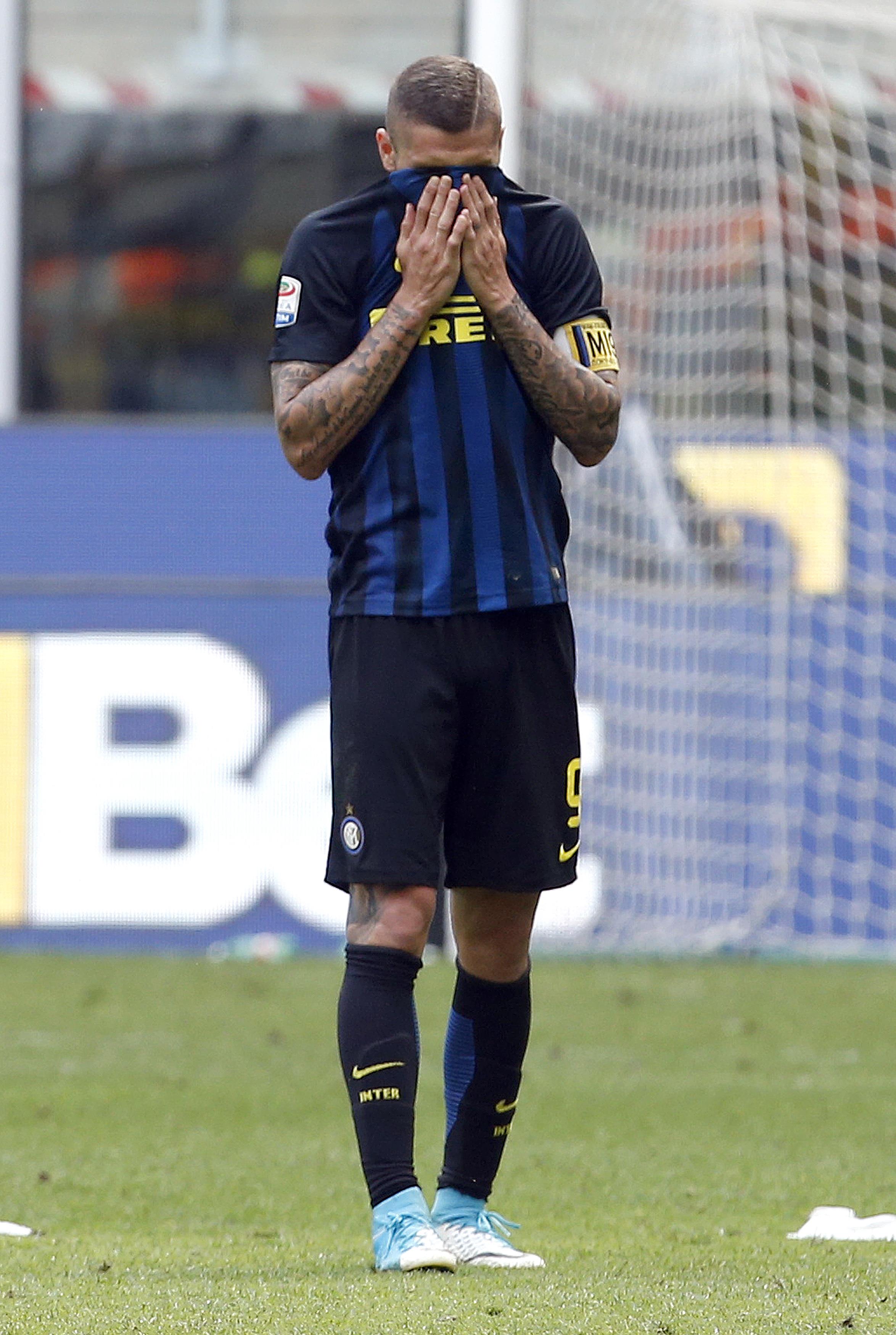 2017-04-15T124045Z_104271515_UP1ED4F0Z7WQO_RTRMADP_3_SOCCER-ITALY-INT-MIL