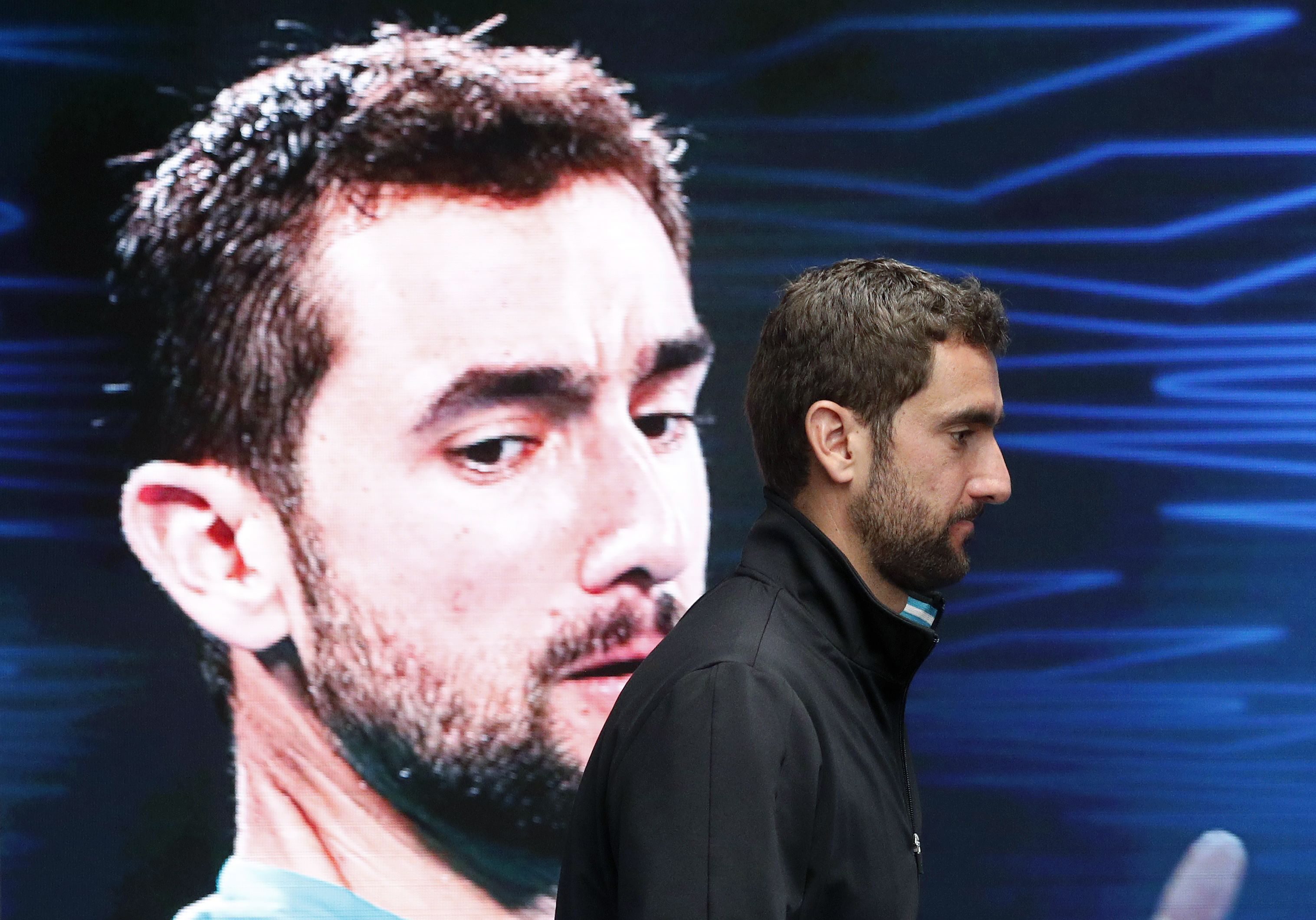 2018-01-28T132156Z_1814320501_HP1EE1S114JEG_RTRMADP_3_TENNIS-AUSOPEN