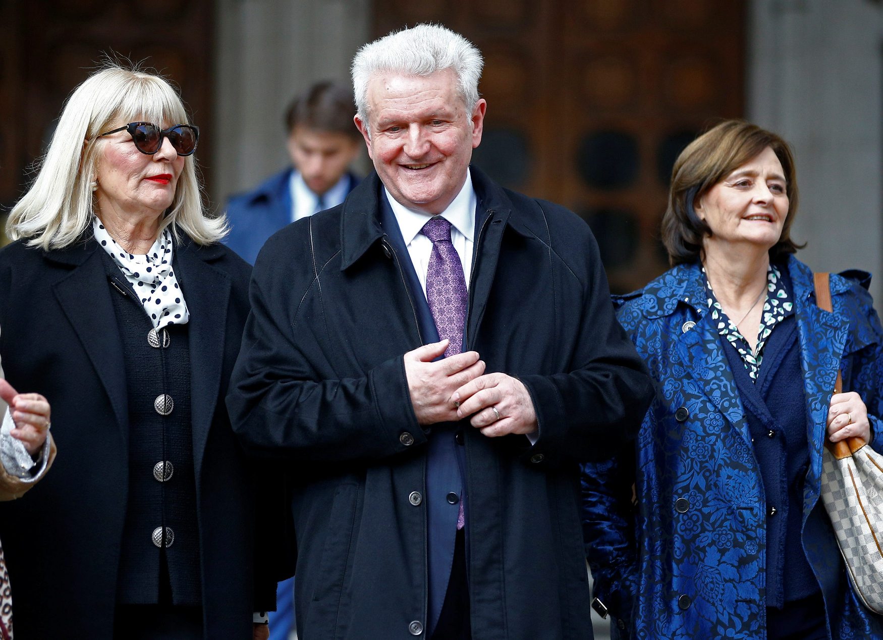 Ivica Todorić emerges from the Royal Courts of Justice with his wife Vesna, and one of his legal team, Cherie Booth, after the court ruled on his extradition, in London, Britain, October 25