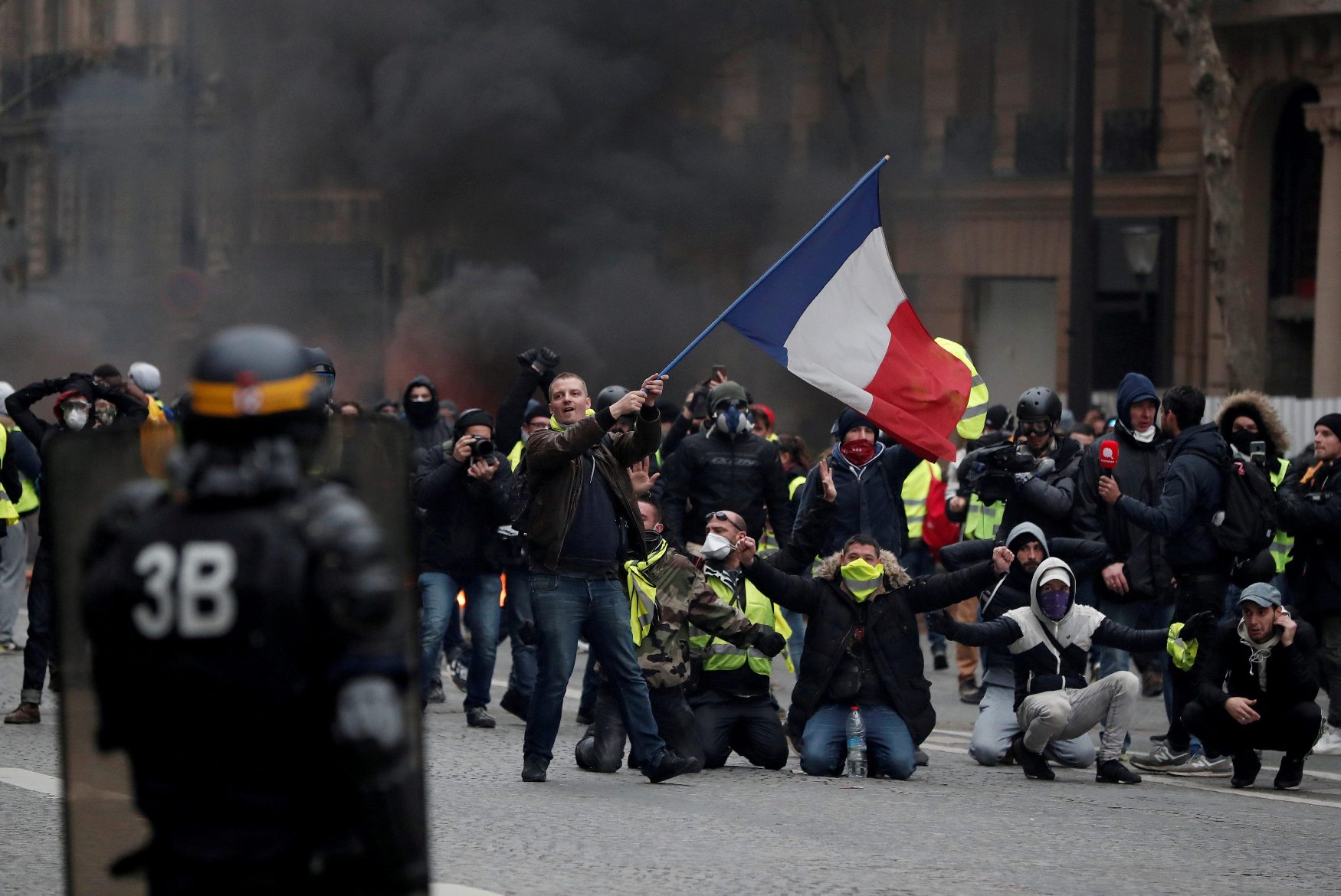 2018-12-13T214304Z_155932231_RC1EC03F3390_RTRMADP_3_FRANCE-PROTESTS-SOCCER