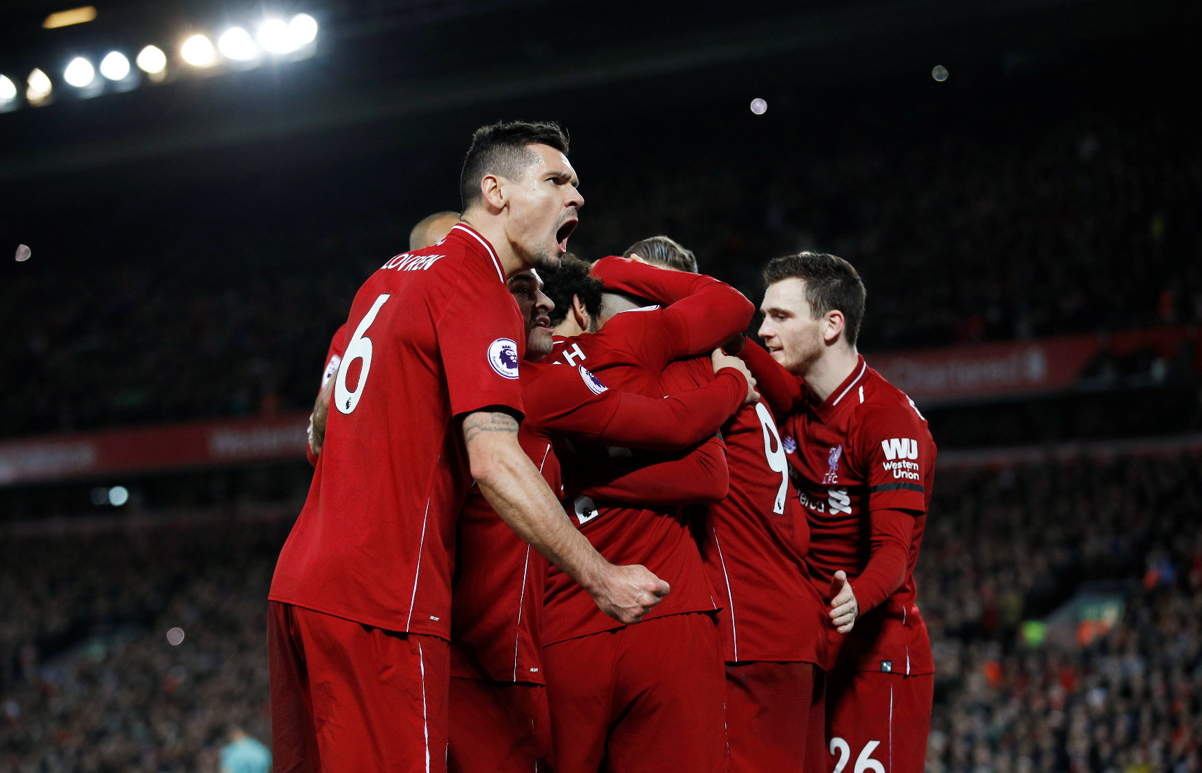 2018-12-29T185605Z_2029416958_RC1B0F6A2CE0_RTRMADP_3_SOCCER-ENGLAND-LIV-ARS_1