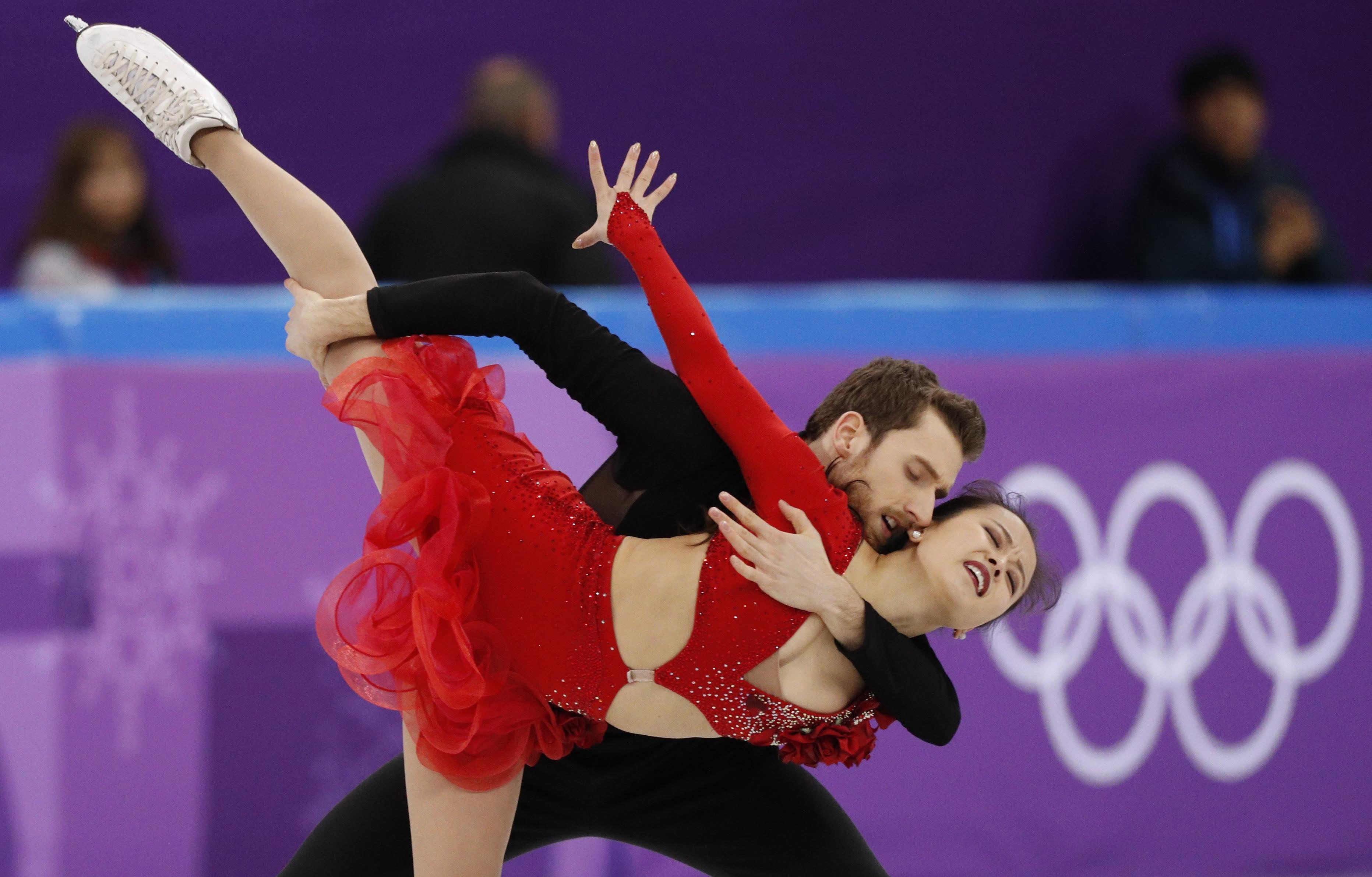 2018-02-11T014525Z_1676686301_DEVEE2B04VOV0_RTRMADP_3_OLYMPICS-2018-FIGS-TEAM-Q