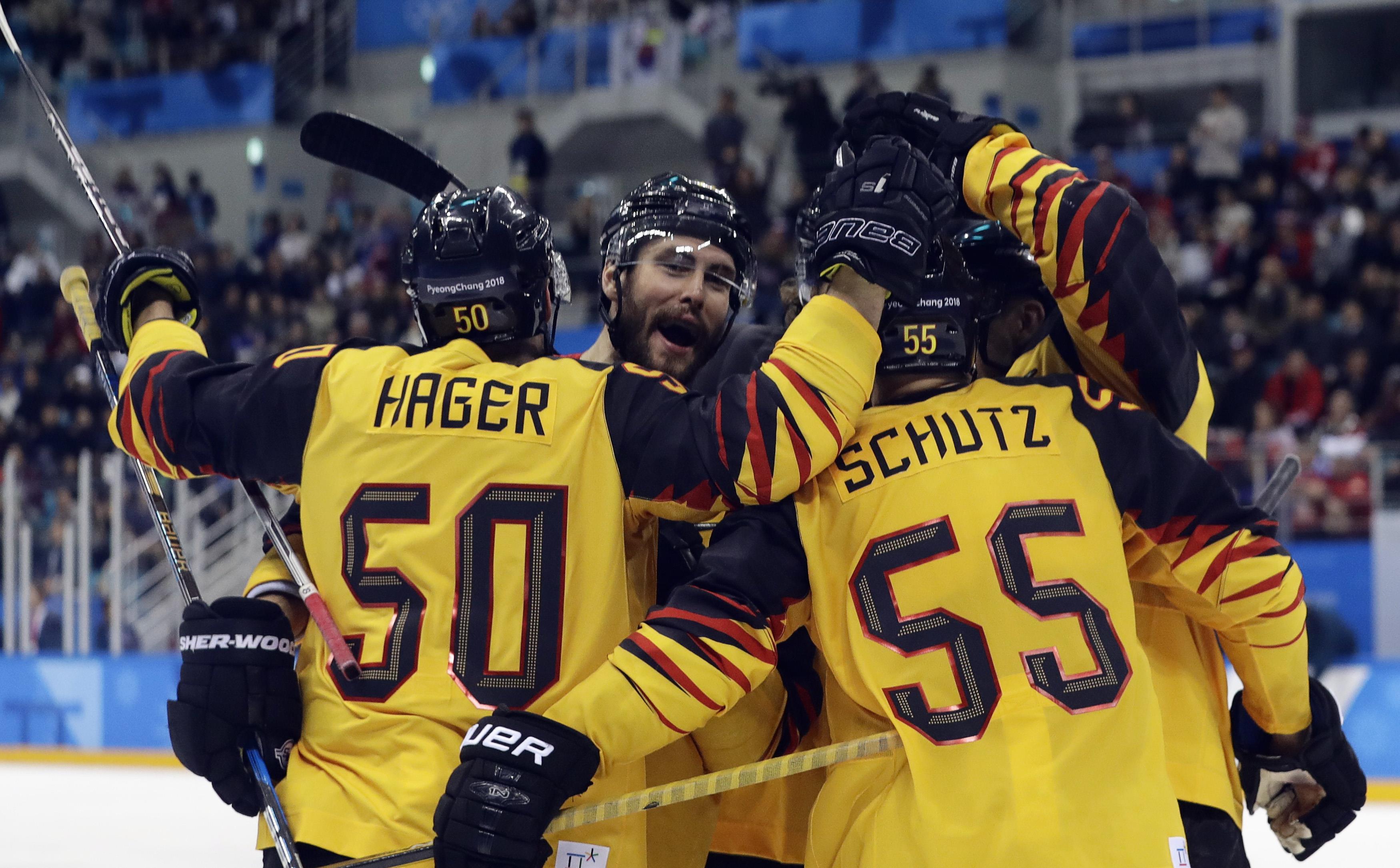 2018-02-23T134209Z_881281390_HP1EE2N1228CT_RTRMADP_3_OLYMPICS-2018-ICEH-M-CAN-GER
