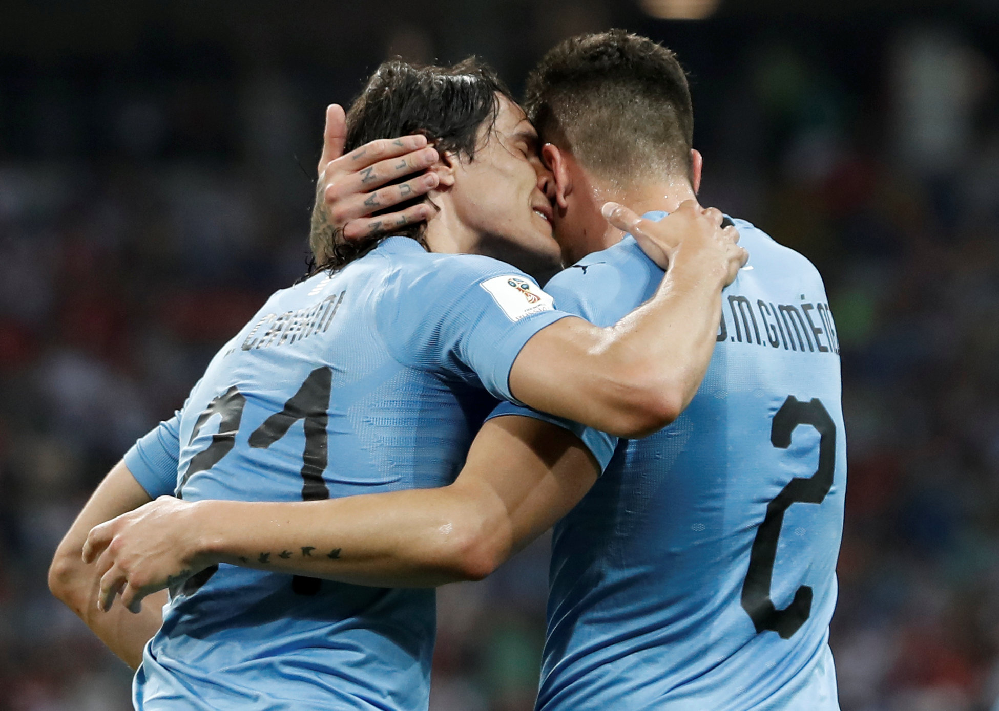 2018-06-30T193054Z_606922320_RC1A7FF09EB0_RTRMADP_3_SOCCER-WORLDCUP-URY-POR