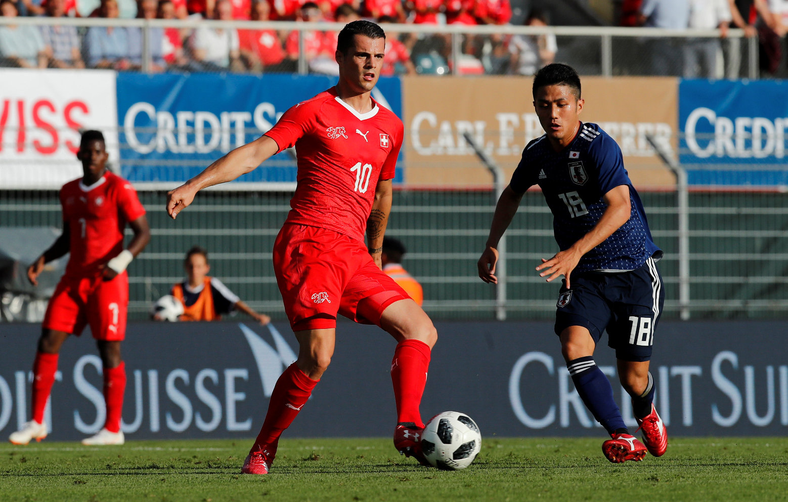 2018-06-08T172017Z_1650207573_RC19F502D5F0_RTRMADP_3_SOCCER-WORLDCUP-SWI-JPN