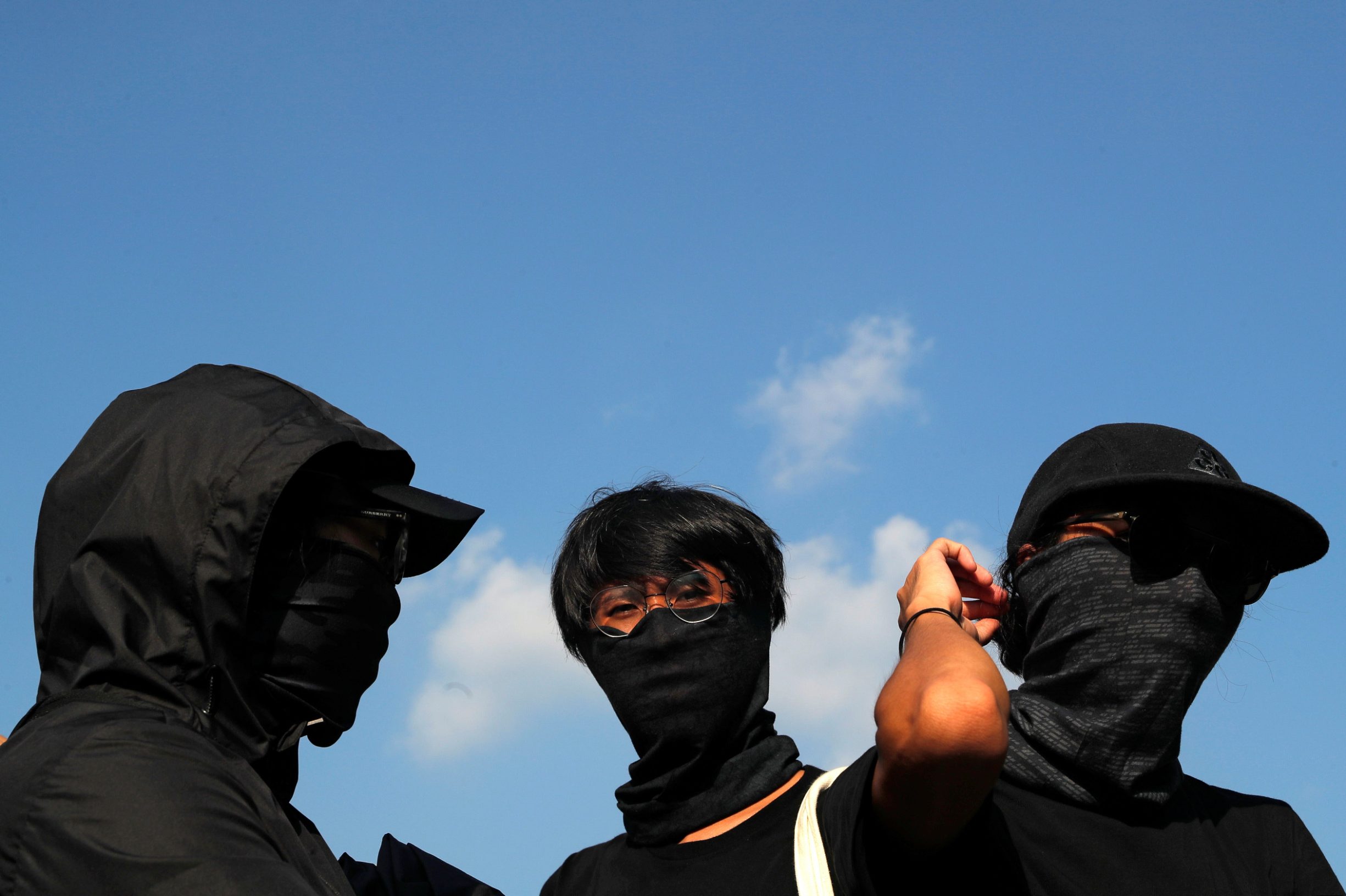 2019-10-03T123526Z_2062908993_RC13D83EA490_RTRMADP_3_HONGKONG-PROTESTS-MASKS