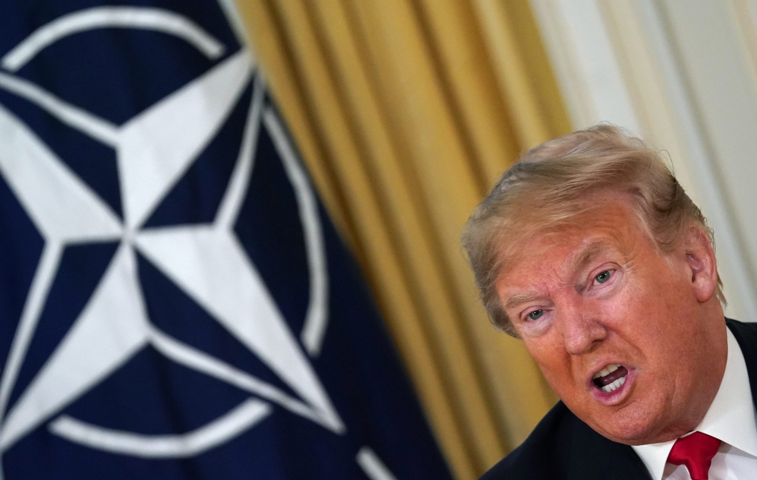 2019-12-03T094758Z_1483369905_RC2LND9WZ4PM_RTRMADP_3_NATO-SUMMIT-TRUMP-STOLTENBERG