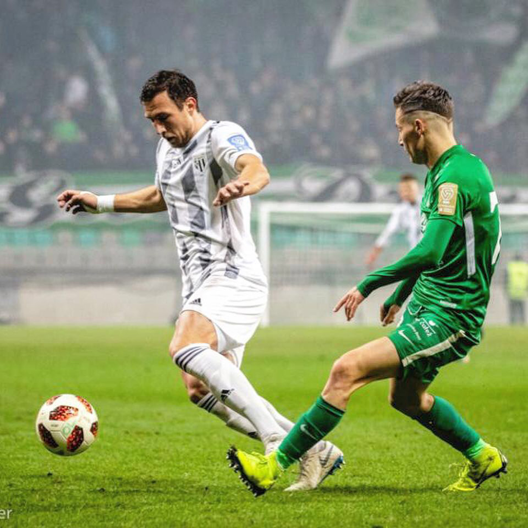 Špiro Peričić (lijevo) dok je nosio dres Mure