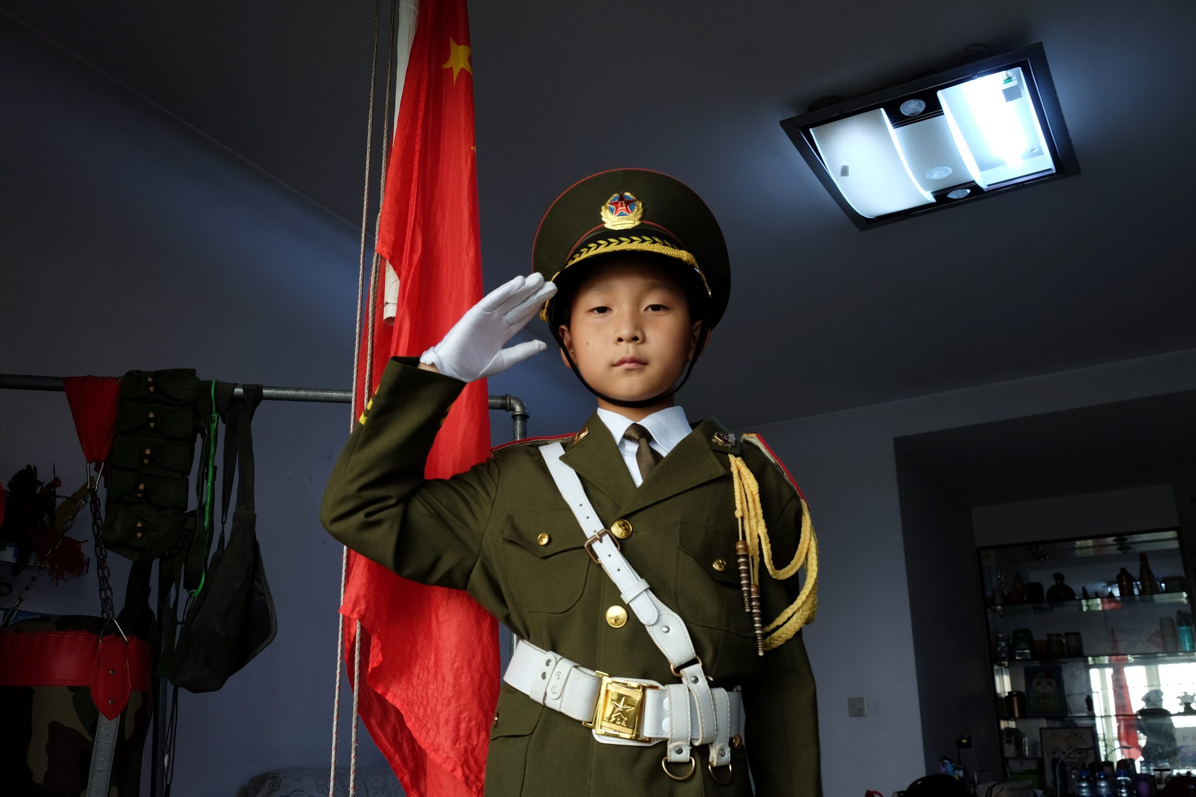 2019-09-28T050648Z_766687284_RC1A732C1330_RTRMADP_3_CHINA-ANNIVERSARY-FLAG-BOY