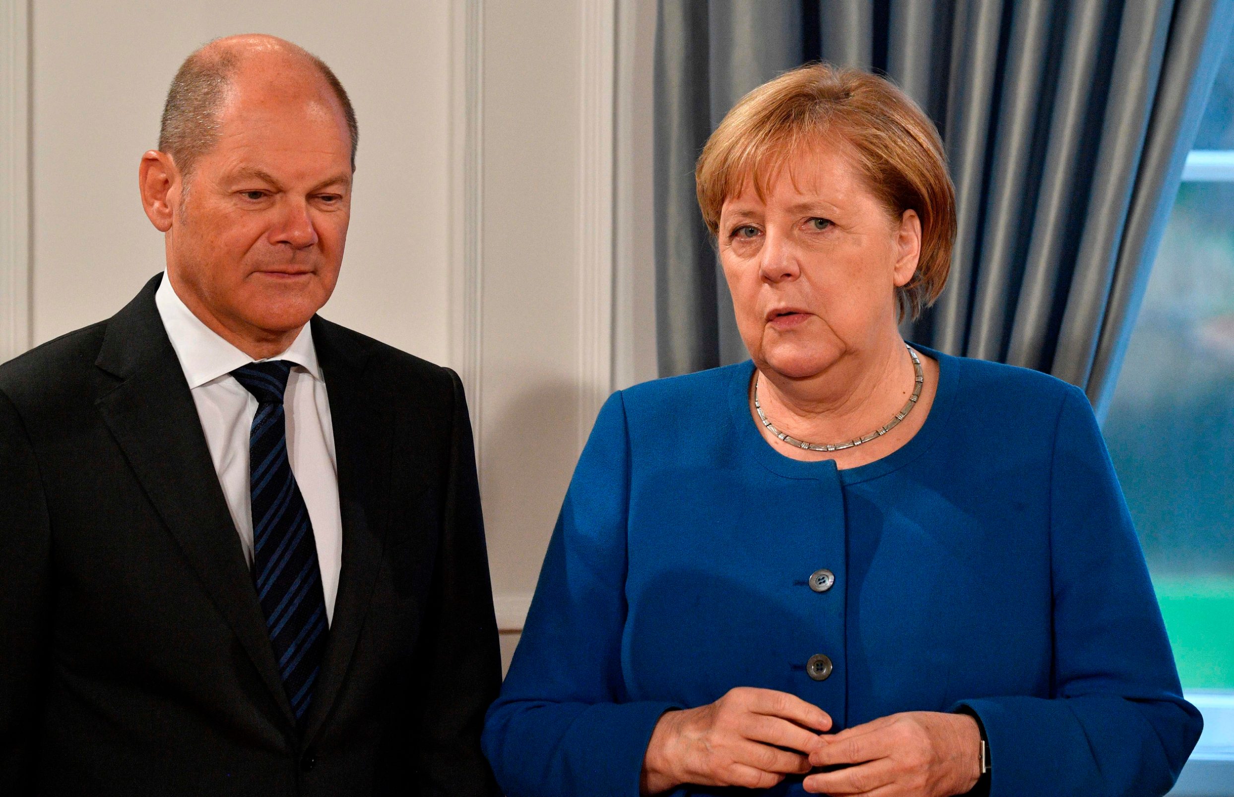 Angela Merkel i njemački ministar financija Olaf Scholz