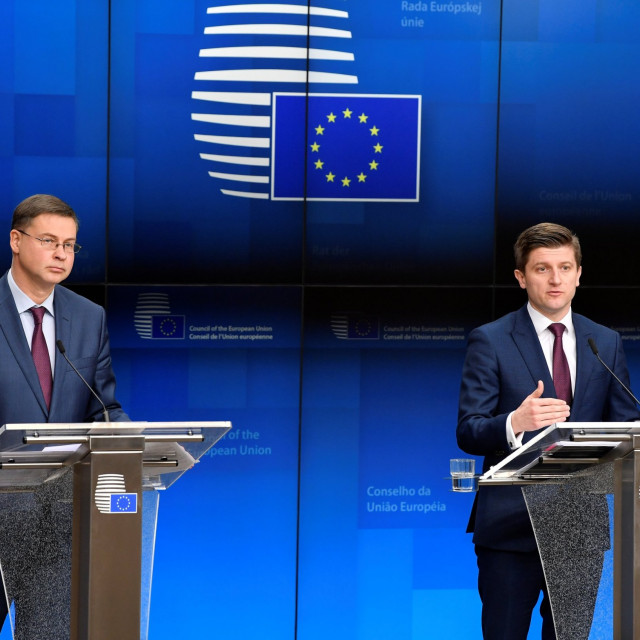 European Commission Vice-President in charge of the Euro, Social Dialogue, Financial Stability, Financial Services and Capital Markets Union  Valdis Dombrovskis  (L)  and Croatian Finance Minister Zdravko Maric 