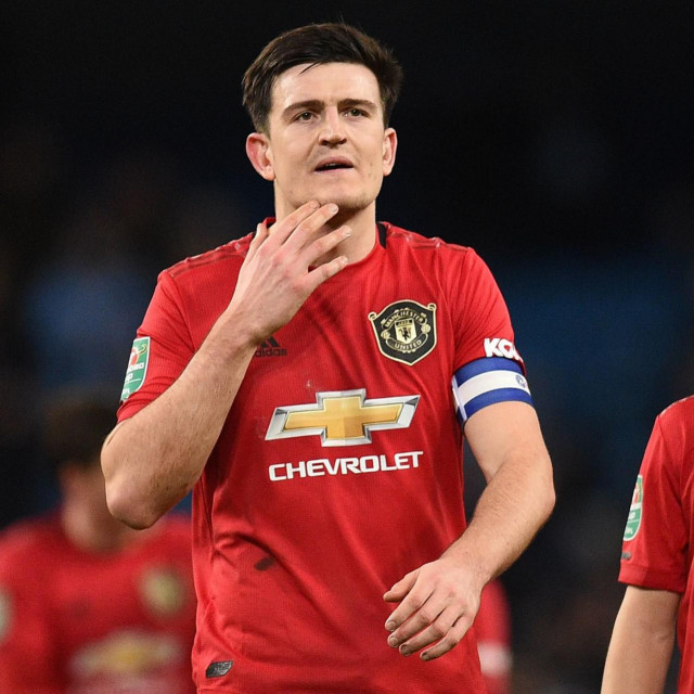 Harry Maguire (lijevo)