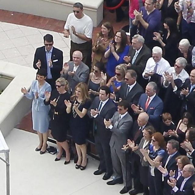 Nov. 17, 2013 - Clearwater, Florida, U.S. - Actors JOHN TRAVOLTA and TOM CRUISE, first row, fifth and sixth from left, applaud Scientology leader David Miscavige during the dedication of their massive Flag Building. The seven-story, $145 million neo-Mediterranean building is also known as the ''Super Power'' building because it reportedly will be the only place where a highly classified Super Power program, first advanced by church founder L. Ron Hubbard in the 1970s, will be conducted.,Image: 176917098, License: Rights-managed, Restrictions: * Tampa Tribune OUT *, Model Release: no, Credit line: James Borchuck/Zuma Press/Profimedia