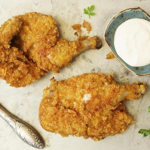 Fried chicken, breaded in corn flakes.