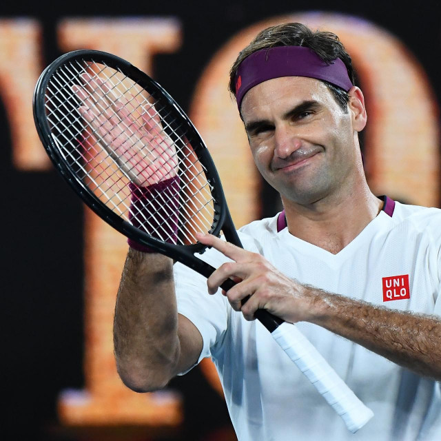 Switzerland's Roger Federer celebrates after victory against Hungary's Marton Fucsovics during their men's singles match on day seven of the Australian Open tennis tournament in Melbourne on January 26, 2020. (Photo by William WEST/AFP)/IMAGE RESTRICTED TO EDITORIAL USE - STRICTLY NO COMMERCIAL USE