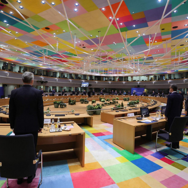 EU leaders observe a minute silent in tribute to late French President Valery Giscard d'Estaing prior to a round table meeting during an EU summit at the European Council building in Brussels, on December 10, 2020. (Photo by Olivier Matthys/POOL/AFP)