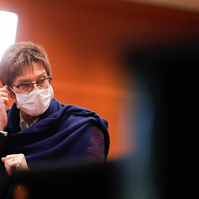 German Defence Minister Annegret Kramp-Karrenbauer wears a face mask as she arrives for the weekly cabinet meeting of the German government at the Chancellery in Berlin, on December 2, 2020. (Photo by Markus Schreiber/POOL/AFP)
