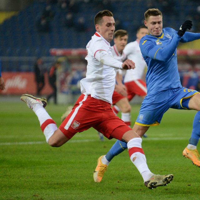 Arkadiusz Milik (lijevo)