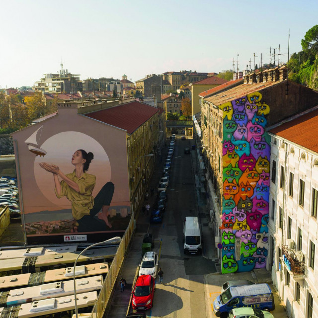 Mural Andreja Žikića Arteza (djevojka s brodićem) i Slavena Kosanovića Lunara (mačke)