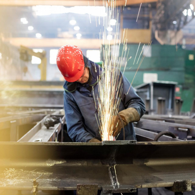 Radnik u američkoj tvornici, ilustracija