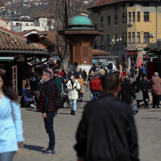 SARAJEVO, BOSNIA AND HERZEGOVINA - MARCH 05: People are seen at streets without social distance as the density of people in the city center increases with the warming of the weather in Sarajevo, Bosnia and Herzegovina on March 05, 2021.In Bosnia and Herzegovina, where mass vaccination against coronavirus (Covid-19) has not started yet and has difficulties in vaccine supply, the number of cases has started to increase again in recent days. Elman Omic/Anadolu Agency (Photo by Elman Omic/ANADOLU AGENCY/Anadolu Agency via AFP)