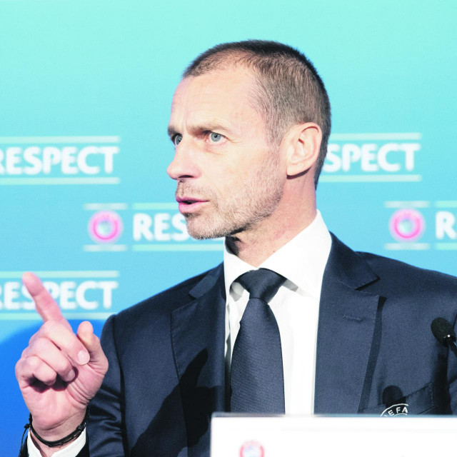 In this handout photograph released by UEFA, UEFA President Aleksander Ceferin addresses media representatives during a press conference following the UEFA Executive Committee meeting in Montreux on April 19, 2021. - Plans for a breakaway Super League announced by twelve of European football's most powerful clubs plunged European football into an unprecedented crisis, with threats of legal action and possible bans for players, as UEFA president Aleksander Ceferin called it a ”spit in the face” for supporters. Six Premier League teams -- Liverpool, Manchester United, Arsenal, Chelsea, Manchester City and Tottenham Hotspur -- joined forces with Spanish giants Real Madrid, Barcelona and Atletico Madrid and Italian trio Juventus, Inter Milan and AC Milan to launch the planned competition. (Photo by Richard Juilliart/UEFA/AFP)/RESTRICTED TO EDITORIAL USE - MANDATORY CREDIT ”AFP PHOTO /UEFA/RICHARD JUILLIART ” - NO MARKETING - NO ADVERTISING CAMPAIGNS - DISTRIBUTED AS A SERVICE TO CLIENTS