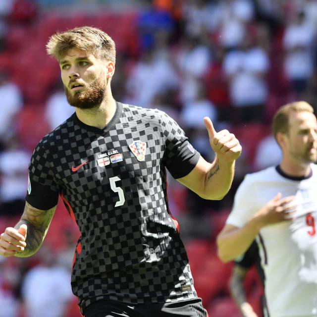 Duje Ćaleta Car i Harry Kane