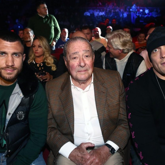 PHILADELPHIA, UNITED STATES - OCTOBER 18, 2019: Ukrainian professional boxer Vasyl Lomachenko (L), US boxing promoter Robert (Bob) Arum (C), and Ukrainian professional boxer Oleksandr Usyk before a light heavyweight world title unification boxing fight between IBF belt-holder Artur Beterbiev of Russia and WBC titlist Oleksandr Gvozdyk of Ukraine at the Liacouras Center in Philadelphia, Pennsylvania, United States. Valery Sharifulin/TASS,Image: 477742675, License: Rights-managed, Restrictions:, Model Release: no, Credit line: Valery Sharifulin/TASS/Profimedia