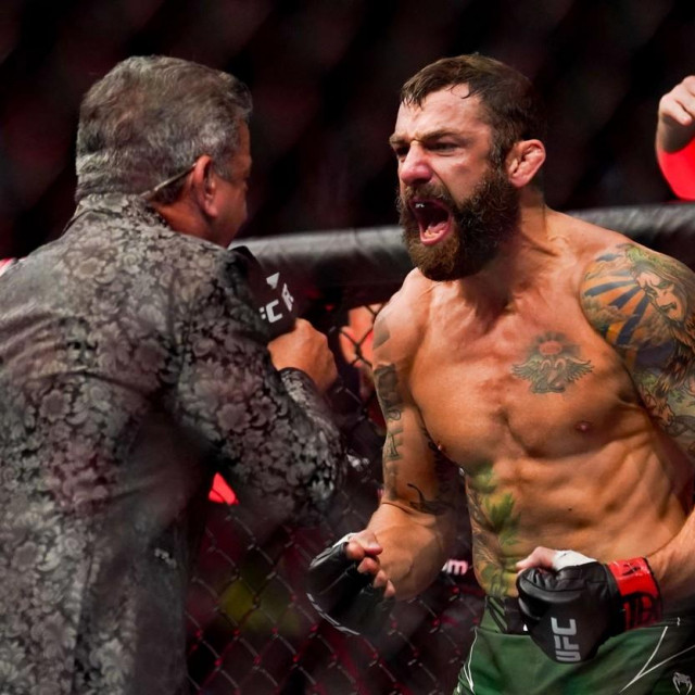 HOUSTON, TX - AUGUST 07: Michael Chiesa is introduced by Bruce Buffer before his bantamweight fight against Vincente Luque at Toyota Center on July 7, 2021 in Houston, Texas. Alex Bierens de Haan/Getty Images /AFP,Image: 626037492, License: Rights-managed, Restrictions:, Model Release: no, Credit line: Alex Bierens de Haan/Getty images/Profimedia