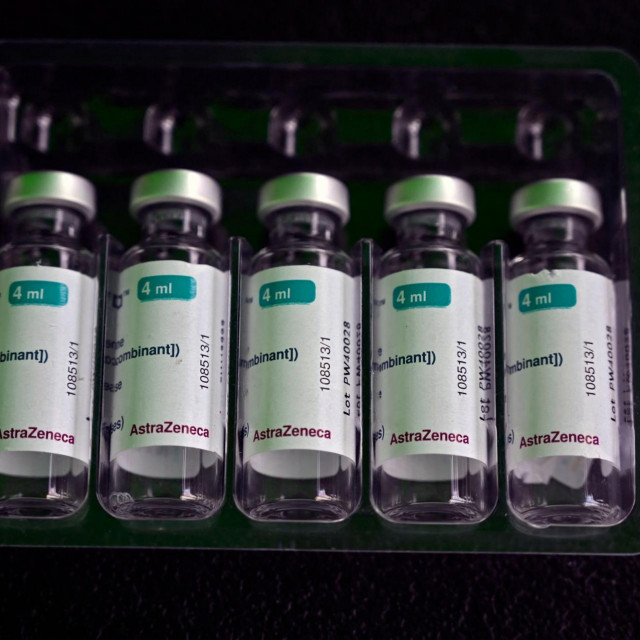 Vials of the AstraZeneca vaccine against COVID-19 are seen at a vaccination center on Constitution Square, in Guatemala City, August 25, 2021, amid a spike in the number of coronavirus cases. (Photo by Johan ORDONEZ/AFP)