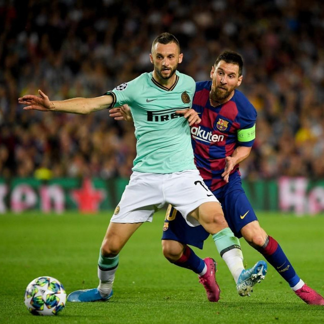Marcelo Brozović i Lionel Messi
