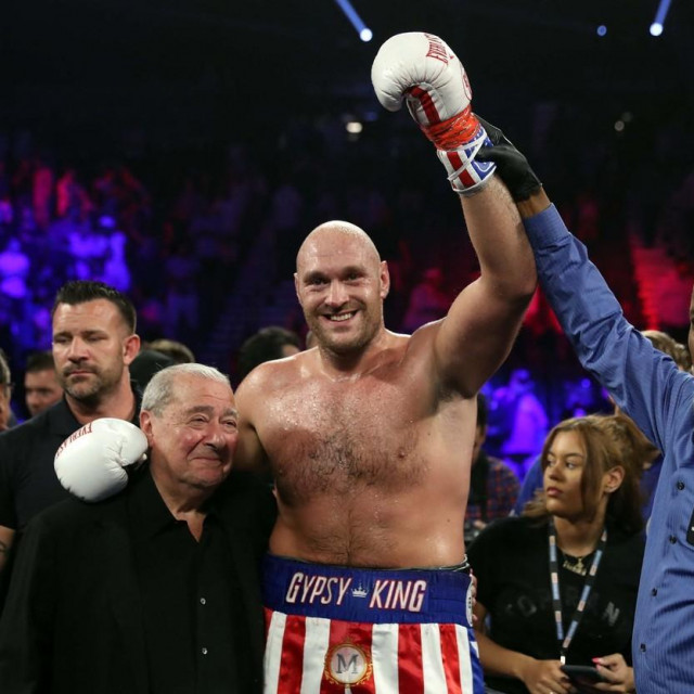 LAS VEGAS, NEVADA - JUNE 15: Tyson Fury (C) poses with boxing promoter Bob Arum (L) and referee Kenny Bayless after defeating Tom Schwarz during a heavyweight fight at MGM Grand Garden Arena on June 15, 2019 in Las Vegas, Nevada. Fury won with a second-round TKO. Steve Marcus,Image: 448122731, License: Rights-managed, Restrictions:, Model Release: no, Credit line: Steve Marcus/Getty images/Profimedia
