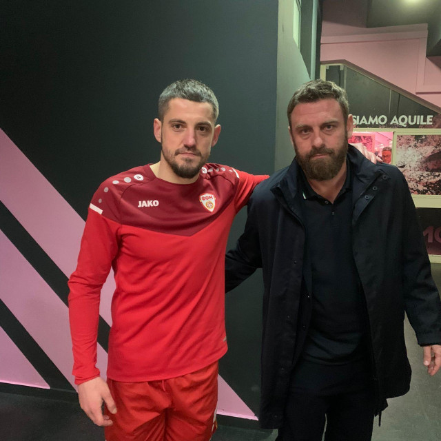 Arijan Ademi i Daniele de Rossi
