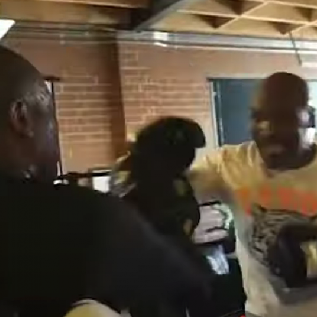 Mike Tyson hitting pads