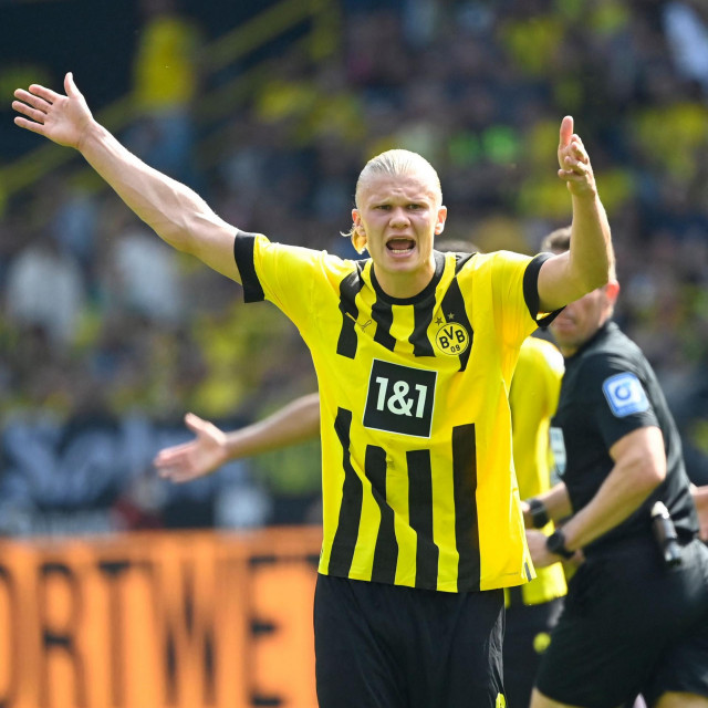 Dortmund's Norwegian forward Erling Braut Haaland reacts during the German first division Bundesliga football match Borussia Dortmund v Hertha BSC Berlin in Dortmund, western Germany, on May 14, 2022. (Photo by Ina FASSBENDER/AFP)/DFL REGULATIONS PROHIBIT ANY USE OF PHOTOGRAPHS AS IMAGE SEQUENCES AND/OR QUASI-VIDEO