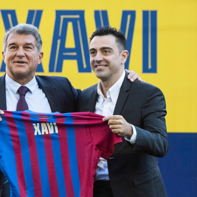 Xavi Hernandez i Joan Laporta