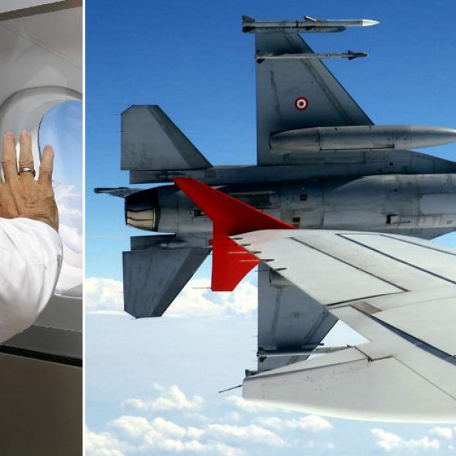 Recep Tayyip Erdogan kroz prozor aviona gleda kako leti borbeni avion F-16 Zračnih snaga Turske