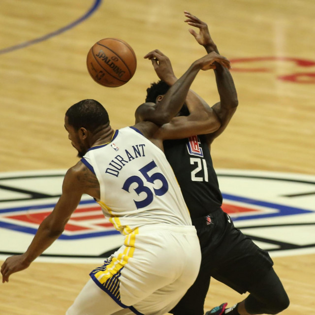 Kevin Durant i Patrick Beverley dok su igrali u Golden State Warriorsima, odnosno Los Angeles Clippersima
