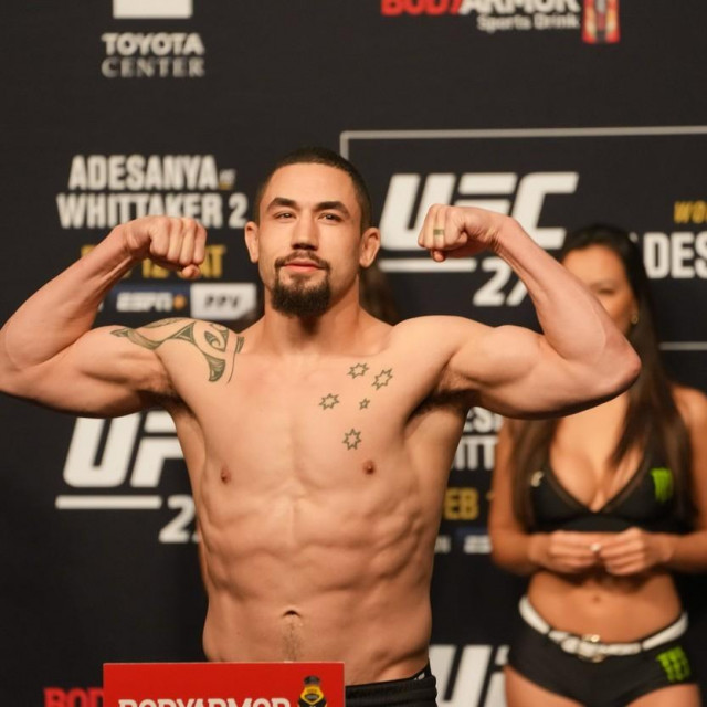 February 11, 2022, Houston, Texas, HOUSTON, TX, United States: HOUSTON, TX - February 11: Robert Whittaker steps on the scale at Toyota Center for UFC 271: Adesanya vs. Whittaker 2 - Ceremonial Weigh-ins on February 11, 2022 in Houston, Texas, United States.,Image: 661644039, License: Rights-managed, Restrictions:, Model Release: no, Credit line: Louis Grasse/Zuma Press/Profimedia