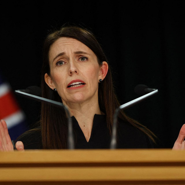New Zealand‘s Prime Minister Jacinda Ardern speaks about a public holiday on September 26 to mark the death of Britain‘s Queen Elizabeth II during a press conference at the Parliament in Wellington on September 12, 2022. (Photo by Marty MELVILLE/AFP)