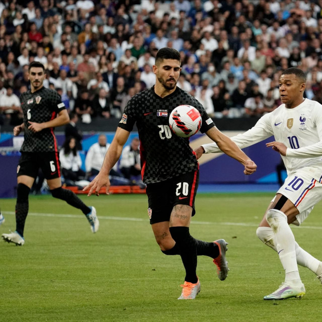 Martin Erlić i Kylian Mbappe