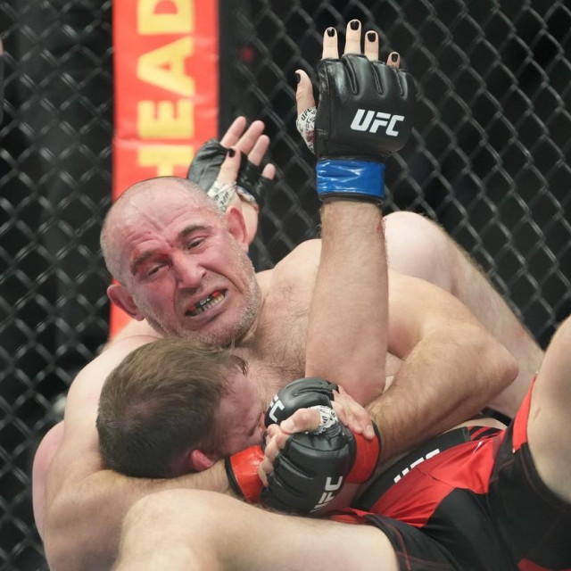 Apr 9, 2022; Jacksonville, Florida, USA; Aleksei Oleinik (red gloves) fights Jared Vanderaa (blue gloves)during UFC 273 at VyStar Veterans Memorial Arena.,Image: 681653024, License: Rights-managed, Restrictions: *** World Rights ***, Model Release: no, Credit line: USA TODAY Network/ddp USA/Profimedia