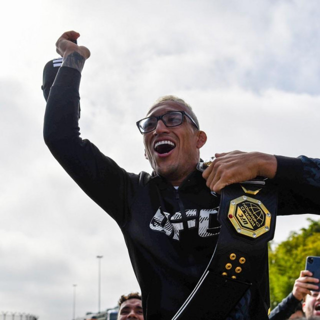 SAO PAULO, BRAZIL - MAY 17: Fans cheer as the MMA fighter Charles Oliveira arrives at Sao Paulo‘s International Airport on May 17, 2021 in Guarulhos, Sao Paulo, Brazil. The Brazilian is the new UFC Lightweight Champion after beating Michael Chandler in the UFC 262.,Image: 611232096, License: Rights-managed, Restrictions: FOR EDITORIAL USE ONLY. Icon Sportswire (A Division of XML Team Solutions) reserves the right to pursue unauthorized users of this image. If you violate our intellectual property you may be liable for: actual damages, loss of income, and profits you derive from the use of this image, and, where appropriate, the costs of collection and/or statutory damages up to $150,000 (USD)., Model Release: no, Credit line: Leandro Bernardes/PxImages/Icon Sportswire/Newscom/Profimedia
