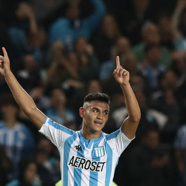 Argentina‘s Racing Carlos Alcaraz celebrates after scoring a goal against Brazil‘s Cuiaba during their Copa Sudamericana group stage first leg football match at the Presidente Juan Domingo Peron stadium in Buenos Aires, on April 13, 2022. (Photo by ALEJANDRO PAGNI/AFP)