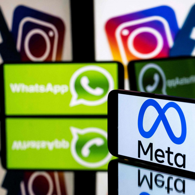 (FILES) In this file photo taken on January 12, 2023 a smartphone and a computer screen display the logos of the Instagram, Facebook, WhatsApp and their parent company Meta. - Tech giants Google, Apple and Amazon will report their latest results on February 2, 2023 as shares in Meta skyrocketed after the Facebook owner posted a smaller-than-expected slump in sales for 2022. (Photo by Lionel BONAVENTURE/AFP)