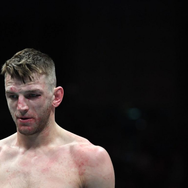 Arnold Allen of England punches Dan Hooker of New Zealand in a featherweight fight during the UFC Fight Night event at O2 Arena on March 19, 2022 in London, England.
UFC Fight Night, Volkov v Aspinall, 02 Arena, London, UK - 19 Mar 2022,Image: 672024765, License: Rights-managed, Restrictions:, Model Release: no, Credit line: -/Shutterstock Editorial/Profimedia